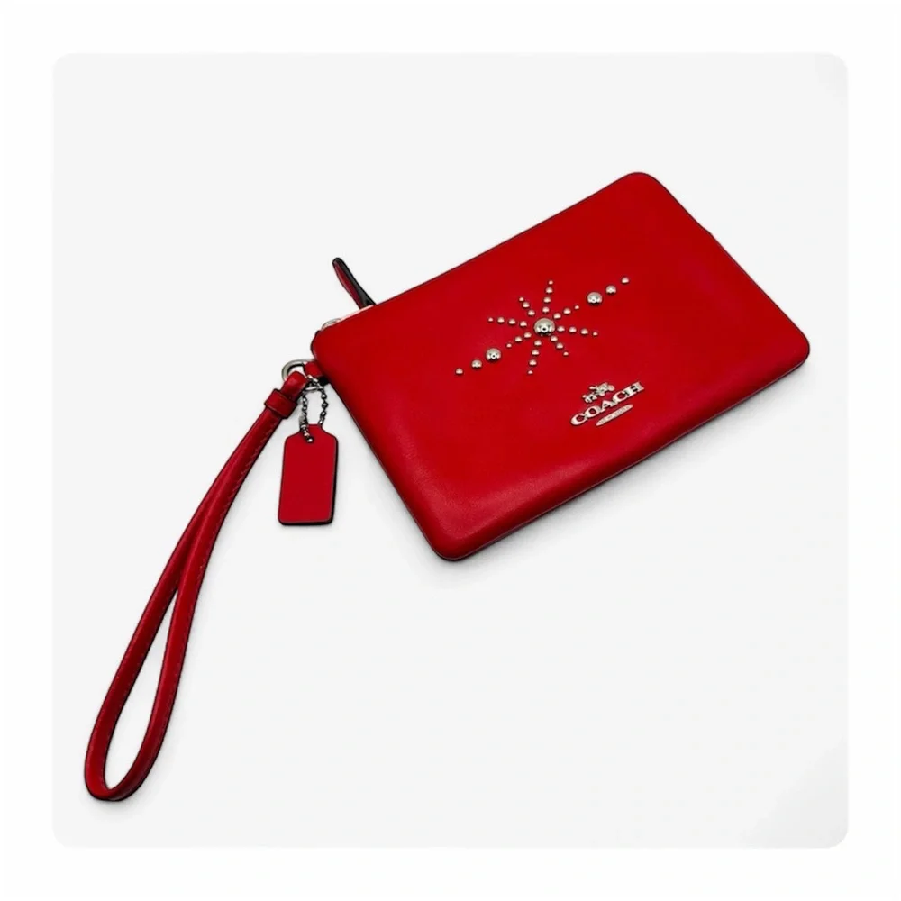 β
Coach RARE Western Rivets Wristlet - Red/Silver β
- Picture 3 of 16